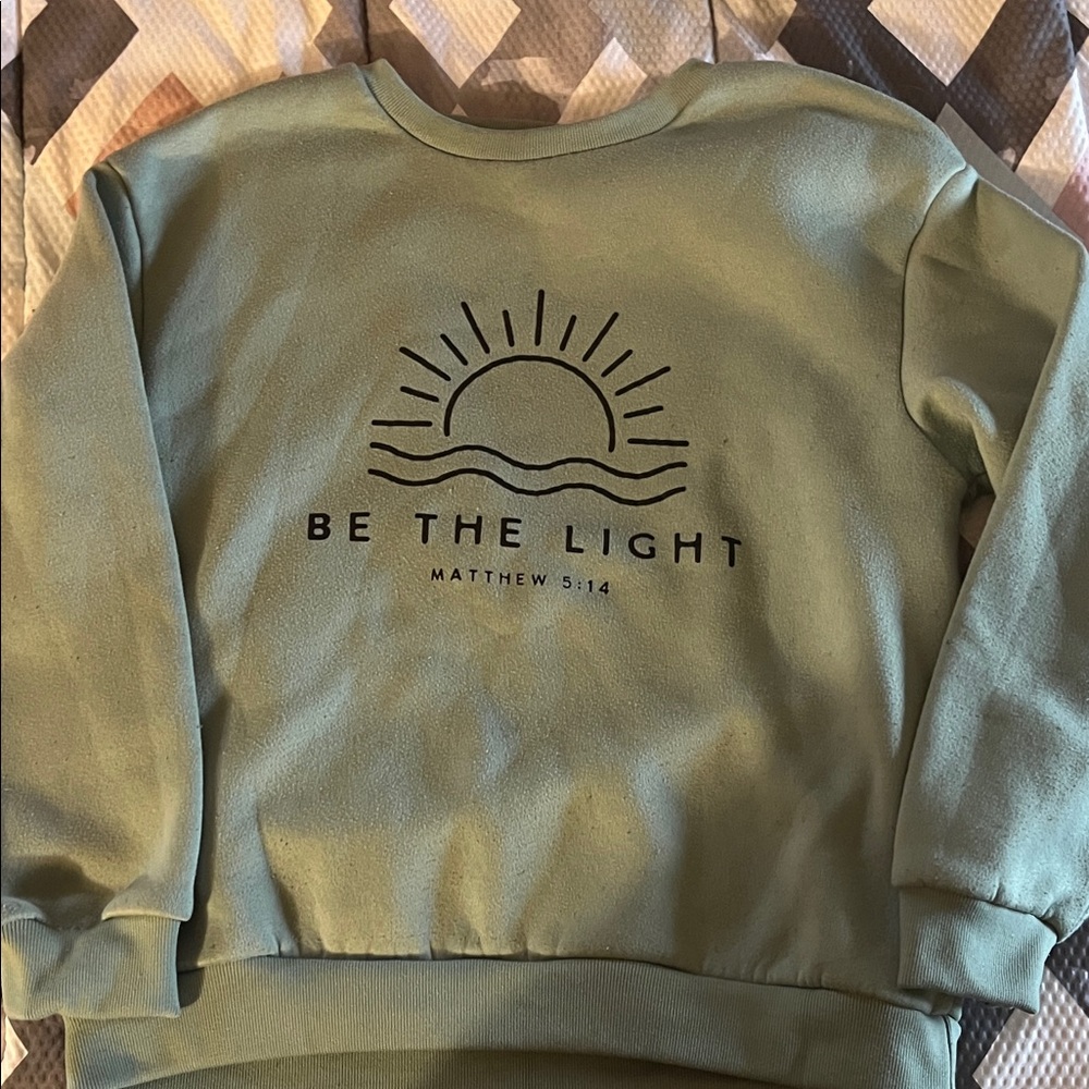 Green Sweatshirt with Sun Graphic
